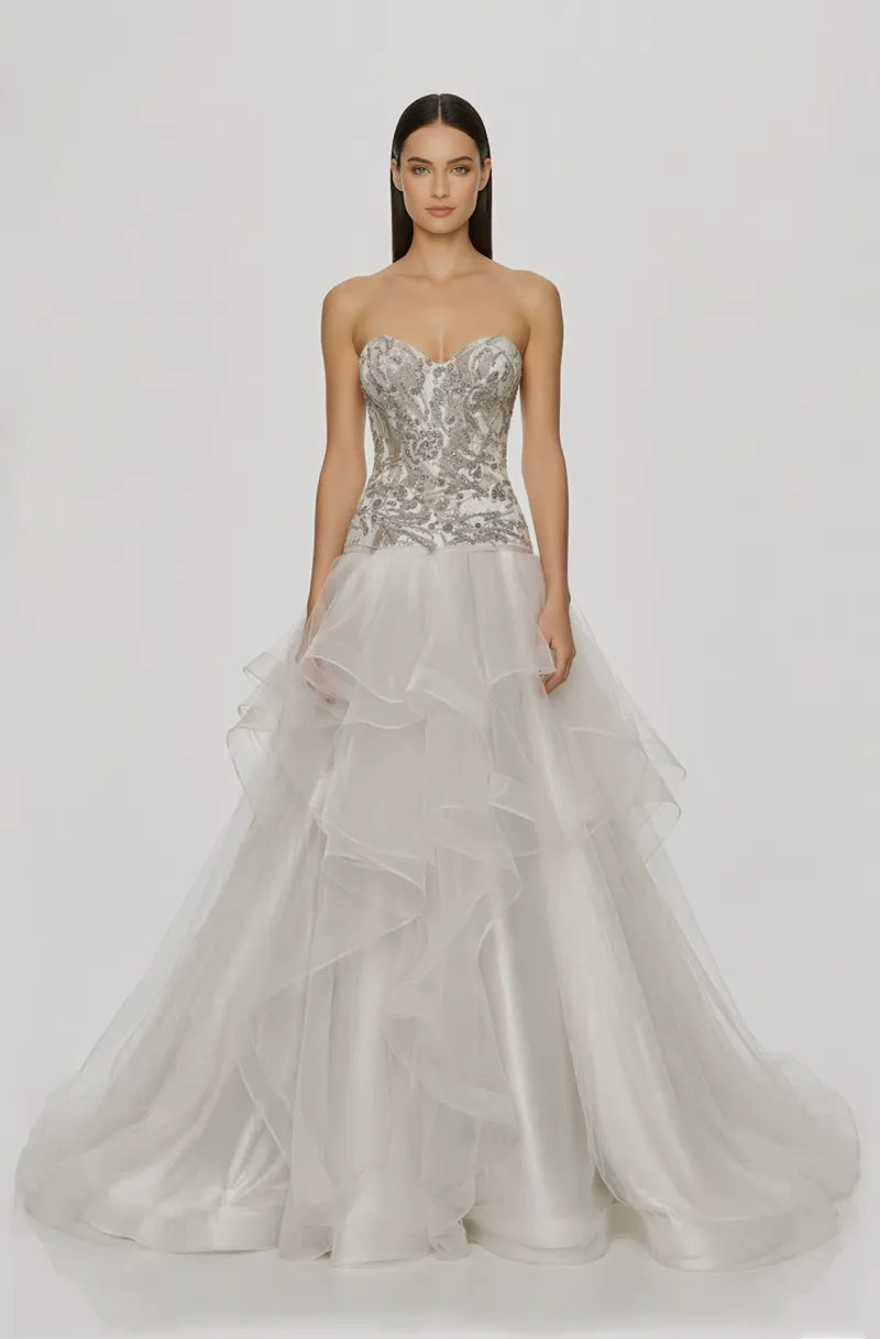 Front view of a woman in an Off-white tulle two-piece ensemble with corset featuring silver hand-beaded embellishment and an asymmetrical layered skirt with horsehair 22, image 1