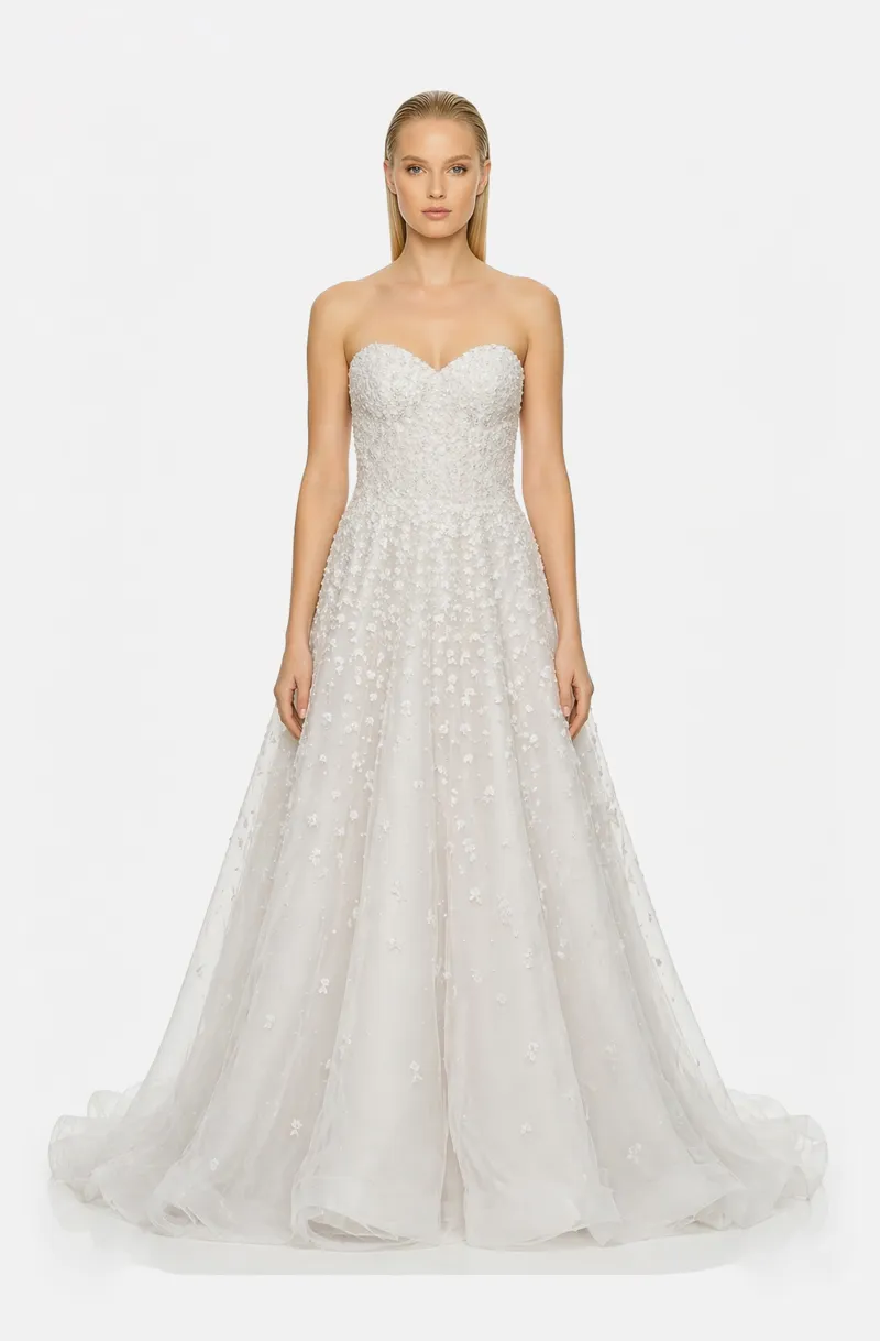 Front view of a woman in an Off-white tulle sweetheart neckline ball gown with cascading floral lace and pearl embellishments 26, image 1