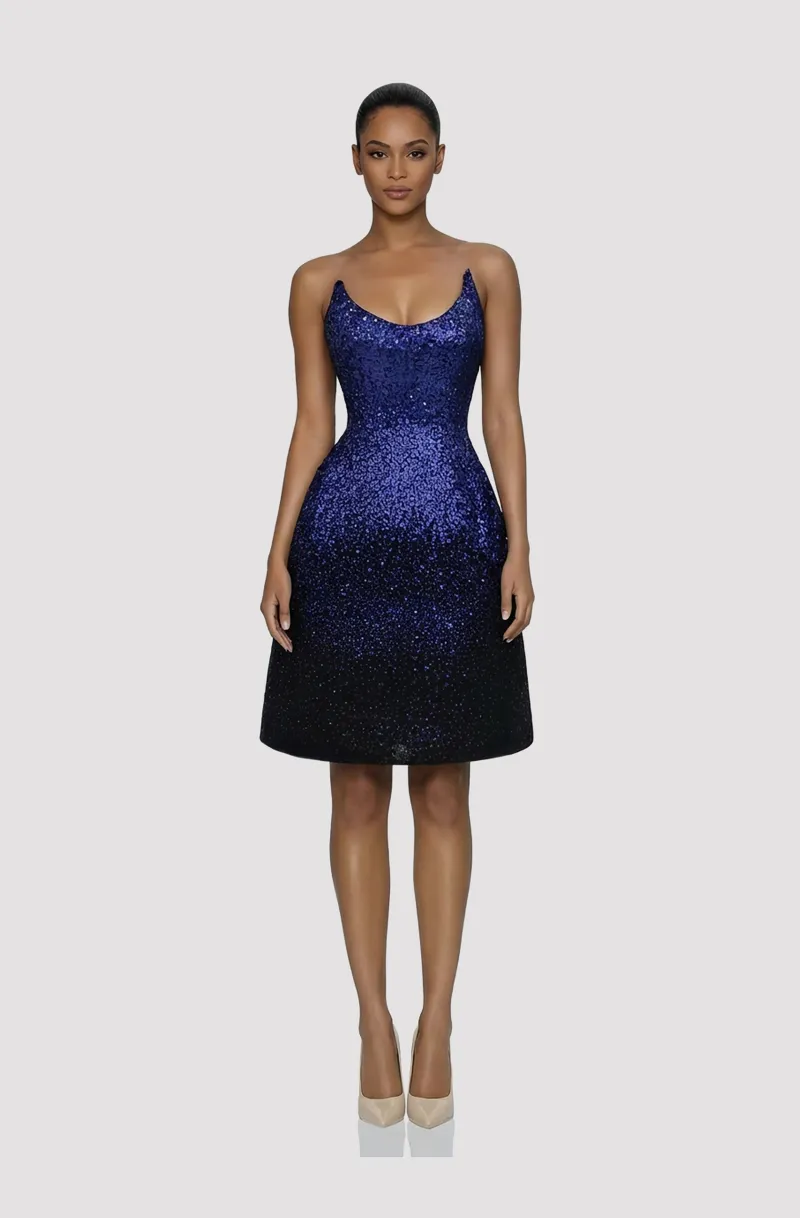 Front view of a woman in a Blue ombre sequined structured cocktail dress with balconette neckline 25, image 1