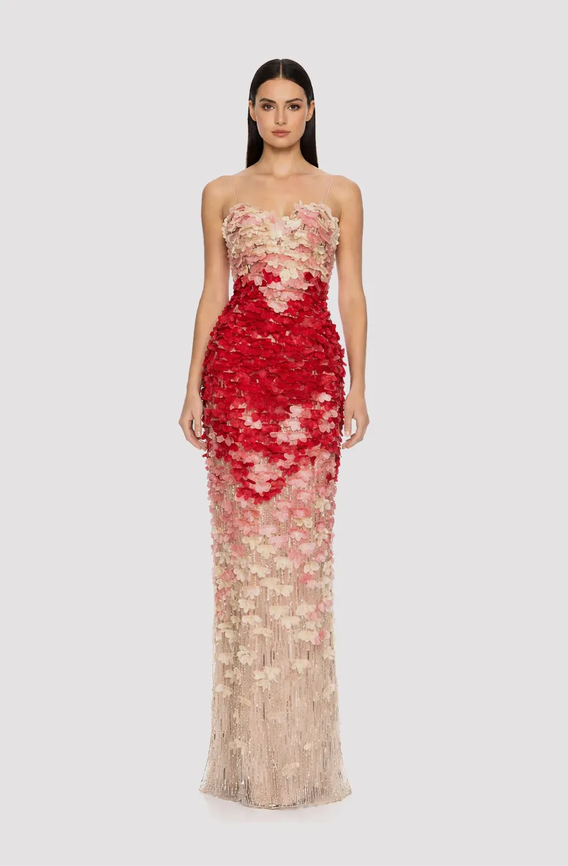 Front view of a woman in a Beaded champagne column gown with ivory, pink, and red 3D flowers 16, image 1