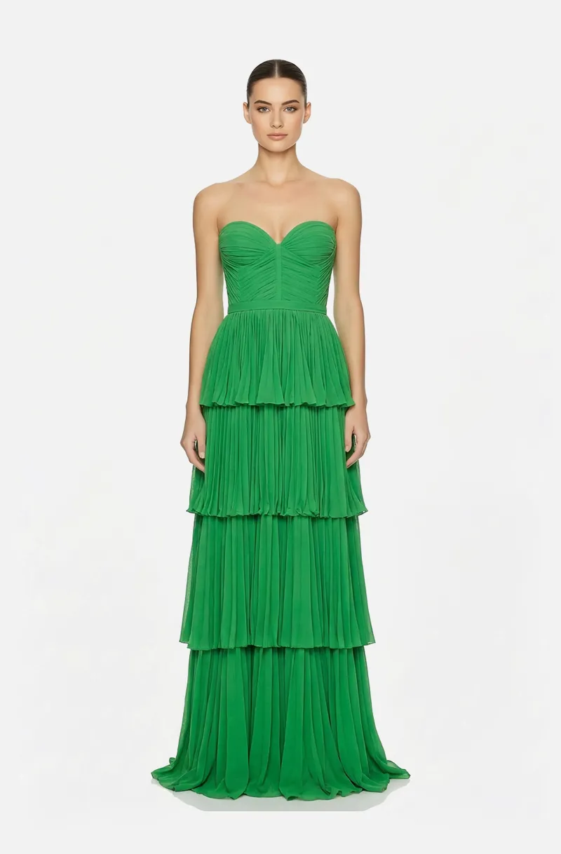 Front view of a woman in an Apple green strapless georgette gown with draped bodice and tiered pleated skirt 4, image 1